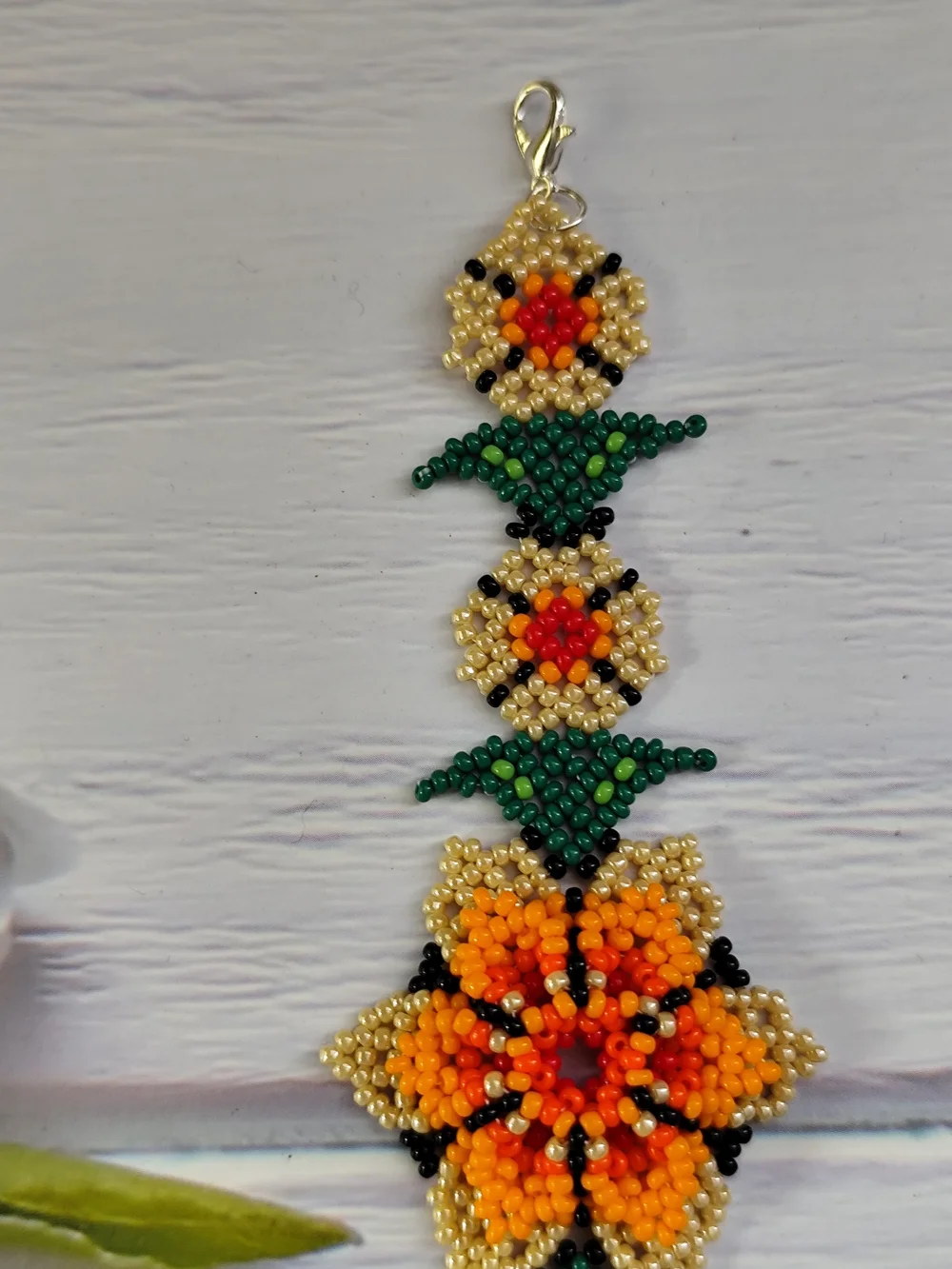 Vibrant Orange Floral Seed Bead Bracelet with Gold & Green Accents